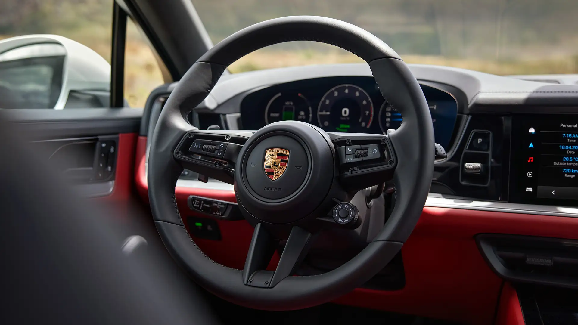  2024 Porsche Cayenne Turbo GTS Coupe driver side view of steering wheel and speedometer