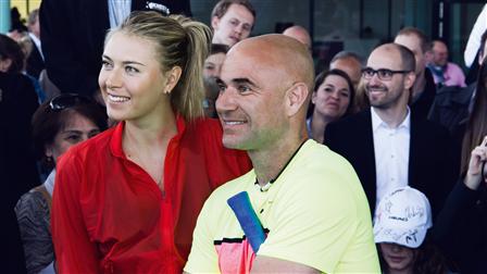 Tennis superstar Maria Sharapova (left) and Andre Agassi