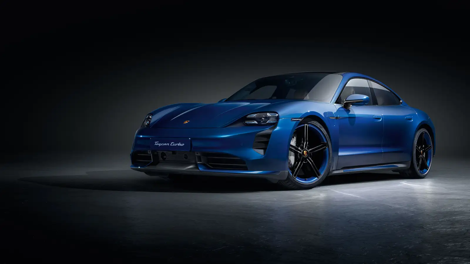  Blue 2024 Porsche Taycan sedan turbo with blue accented wheels